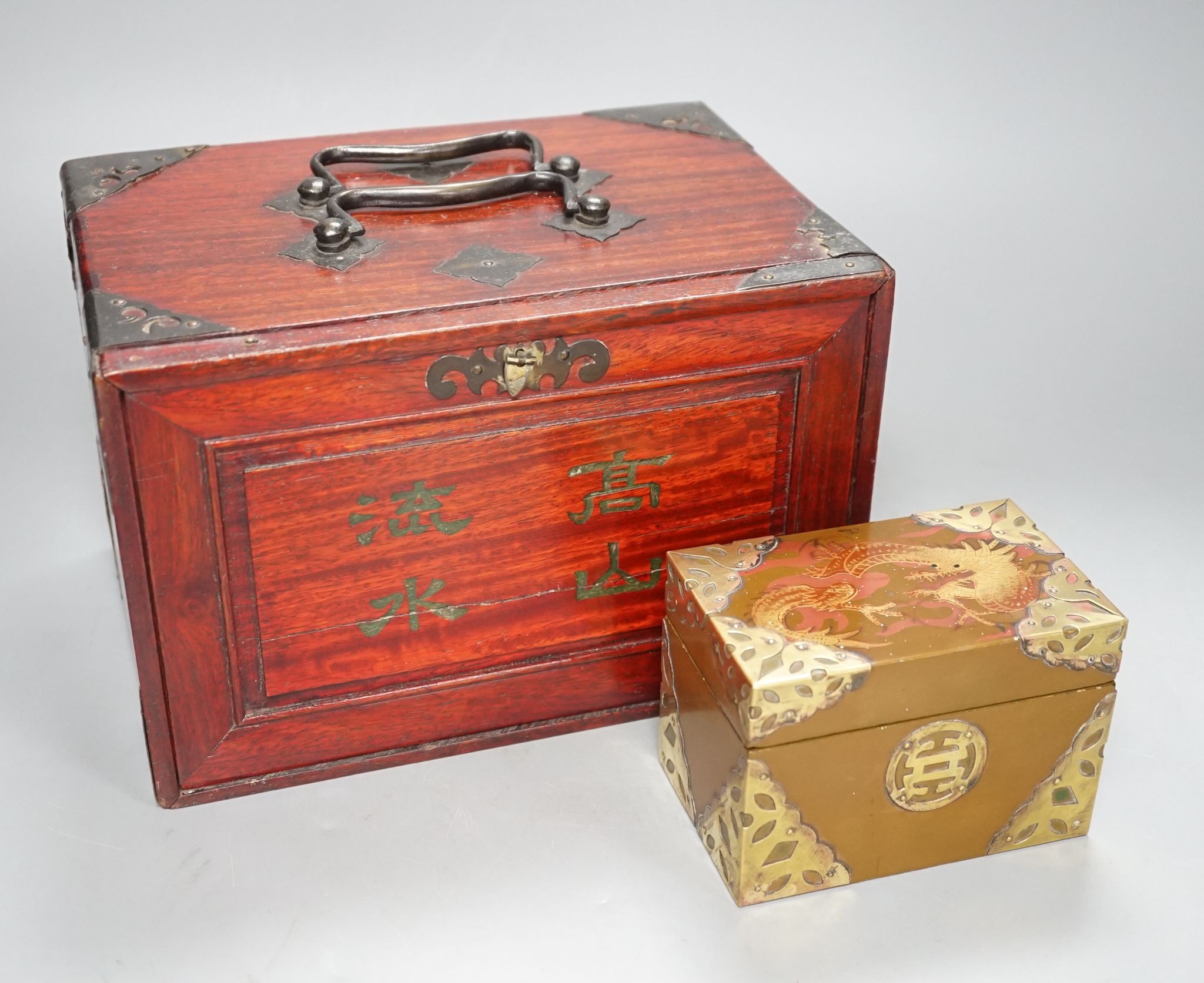 A MahJong set and a Chinese brass mounted card case., MahJong set, 15.5 cms high x 23.5 cms wide.